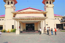 The sealed gate of the Amtar cricket stadium at Nadaun in Hamirpur on Sunday.