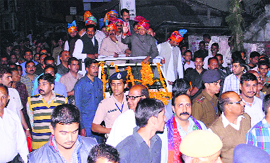 Chief Minister Virbhadra Singh participates in a shobha yatra on the opening of Hamir Utsav in Hamirpur on Sunday.