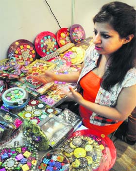 A girl shows homemade chocolates in Ludhiana