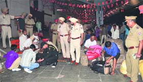 A joint team of the city police and the GRP checks the luggage of passengers at the Ludhiana railway station