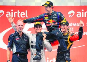 Vettel became the fourth quadruple champion and only the third driver to land four titles in a row after Germanys seven-times winner Michael Schumacher and the late Argentine Juan Manuel Fangio by winning the Indian Grand Prix at the Buddh International circuit in Greater Noida, on Sunday