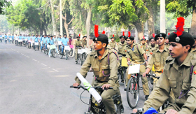NCC cadets and students of Giani Zail Singh PTU campus participate in a cycle rally organised to spread awareness on the need for conservation of environment, in Bathinda on Monday.