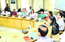 District Magistrate, Dr Nidhi Pandey, holds a meeting with officials in Haridwar on Monday. 