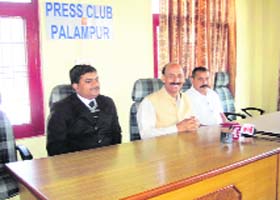 Ravinder Thakur, former IPH Minister, addresses a press conference in Palampur on Monday