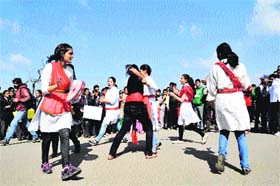 Ex-students of Chelsea during a road show "Stop violence against women" on the Ridge in Shimla on Saturday