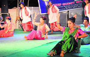 Artistes present a dance item during the eight-day long Diwali festival organised by Jammu and Kashmir Academy of Art, Culture and Languages and J&K Tourism Department in Jammu on Monday.