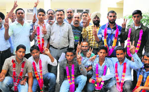 Office-bearers of the Peoples Democratic Party welcome new entrants in Jammu on Monday. 