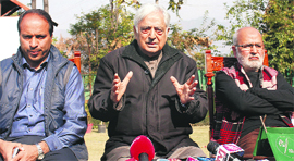 PDP patron Mufti Mohammad Sayeed (centre) addresses a press conference in Srinagar on Monday.