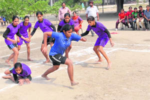Players in action during a kabaddi match between teams of Bathinda and Mansa at the 59th Punjab State School Sports Tournament in Bathinda on Tuesday. 