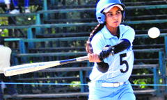 A player strikes a shot during the All-India Inter-University Baseball Championship at Panjab University in Chandigarh on Tuesday. Tribune Photo: Pradeep Tewari