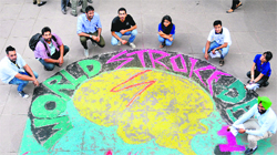 Students of Panjab University celebrate World Stroke Day at the Student Centre on Tuesday. Tribune photo: Pradeep Tewari