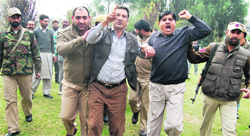 Police takes government employee leaders into preventive custody in Srinagar on Tuesday. Tribune Photo: Amin War