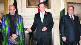 (From Left) Afghanistan President Hamid Karzai, UK Prime Minister David Cameron and Pakistan Prime Minister Nawaz Sharif at a trilateral meeting in London.