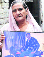Ram Rani, mother of Kuldeep Sharma who committed suicide in Amritsar. Photo: Vishal Kumar