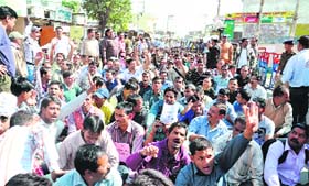 UP IN ARMS: Leaders of Uttarakhand Power Contractual Employees Association stage a dharna in Dehradun on Wednesday