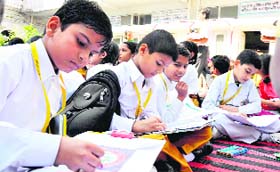 Students take part in an inter-school drawing competition at Doon Public School, Bhoopatwala, in Haridwar on Wednesday
