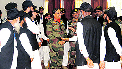 Army officers interact with a group of sarpanches and panches in Udhampur on their return from a national integration tour on Wednesday