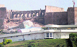 A damaged wall of the Bahu Fort in Jammu