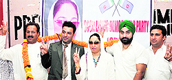 Darakhshan Andrabi, SDP president, welcomes new entrants into the party fold at a function in Jammu on Wednesday