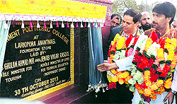 Ghulam Ahmad Mir, Minister for Tourism, lays the foundation stone of Government Polytechnic College at Larkipora Anantnag, south of Srinagar on Wednesday