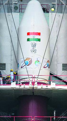 Technicians inspect the PSLV at the Satish Dhawan Space Sentre, Sriharikota, on Wednesday