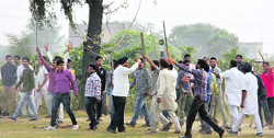 Dera Sacha Sauda followers protest in Moga on Wednesday. A Tribune photo
