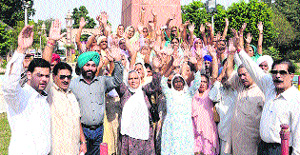Members of the All-India Terrorist Victims Association hold a protest in Amritsar on Thursday.