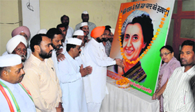 Congress workers pay floral tributes on the death anniversary of former Prime Minister Indira Gandhi in Bathinda onThursday.