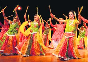Students of Holy Child School, Panchkula, perform dandia  during the annual function at Tagore Theatre in Sector 18, Chandigarh, on Thursday