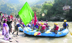 Shyam Singh, IG, Sahastra Seema Bal, flags off the SSB river rafting expedition at Pithoragarh on Thursday. A Tribune photograph