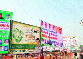 Hoardings of political parties installed at Laal Batti chowk in Fatehabad