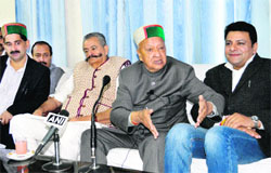 Chief Minister Virbhadra Singh addresses a press conference in Dharamsala on Thursday.