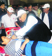 Chief Minister Bhupinder Singh Hooda talks to a donor at a mega blood donation camp in Ambala on Thursday.