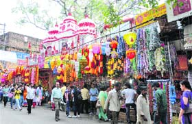 A view of a market abuzz with activity ahead of Diwali in Jammu on Thursday