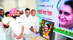 Members of the District Congress Committee pay tributes to Indira Gandhi on Thursday. Photo: Inderjeet verma