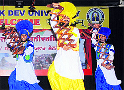 Students present an item during the inter-zone youth festival (final) of the GNDU in Amritsar on Friday