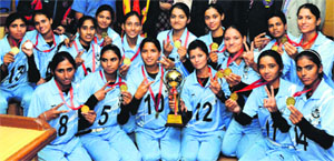 Members of the Panjab University team strike a pose after winning the All-India Inter-University Baseball Tournament in Chandigarh.