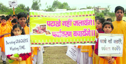 Students of Gayatri Vidyapeeth School, Shantikunj, hold an anti-cracker awareness drive in Haridwar on Friday. Tribune photo: Rameshwar Gaur