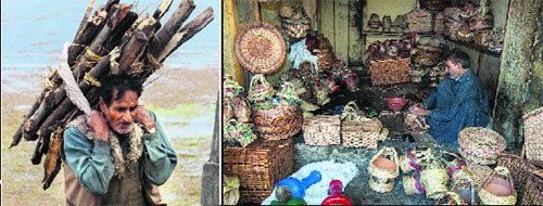 A man carries wood near the bank of the Dal Lake a worker makes kangris (firepots) at his shop in Srinagar on Friday