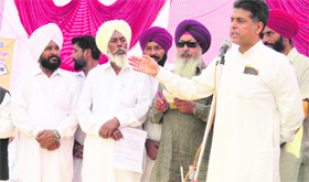 Union Information and Broadcasting Minister Manish Tewari addresses a gathering in Jagraon on Friday.