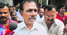 CBI officials on the premises of Rajya Sabha MP Anil Sahani in Muzaffarpur on Friday.