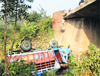 A truck that fell into a gorge at Subhapur in Kapurthala on Saturday. A Tribune photograph