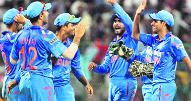 Indian players celebrate the wicket of George Bailey during the 7th ODI against Australia at Chinnaswamy stadium in Bengaluru on Saturday.  PTI