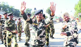 Officers and jawans of the Border Security Force dance on the occasion of Diwali at the Wagah border check post, near Amritsar, on Sunday.
