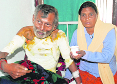 Ramu with his wife at the General Hospital in Panchkula on Monday. Tribune photos