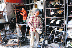 Officials retrieve files after a fire broke out at the office of the Food and Supplies Department, Haryana, in Sector 17, Chandigarh, on Sunday. Tribune photo: Manoj Mahajan