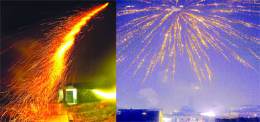 Rockets fired from the balconies of two houses light up the Diwali night in the Capital