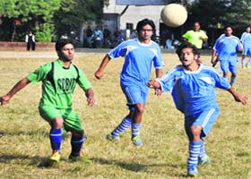 A match in progress during the Jaideep Bhandari Memorial Football Tournament in Dehradun on Monday