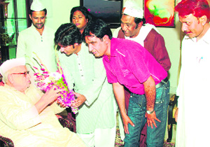 Sufi musicians from Pakistan, Wahdat Rameez and Husnain Javed, meet Governor Aziz Qureshi in Dehradun on Sunday. 