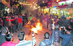MC president Manmohan Mall takes part in the Bagwal festival celebrations in Mussoorie on Monday. 
